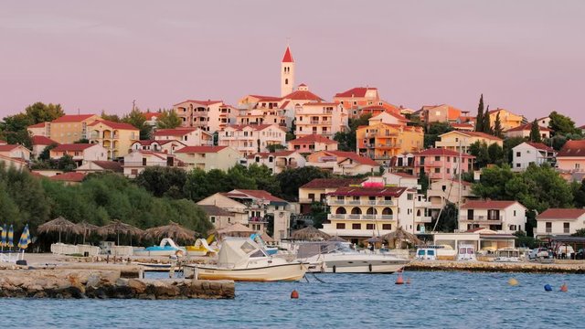 Small croatian town Seget Donji near the Trogir town at sunset, Croatia