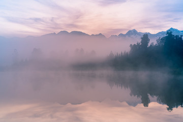 Obraz na płótnie Canvas Morning fox over Matheson water lake, New Zealand natural landscape