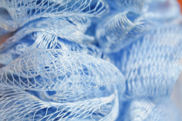 Bath loofah abstract background. Washing cloth backdrop. Washcloth close up. Bright colorful texture