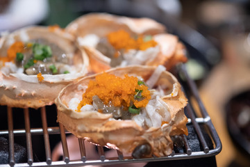 Zuwai Kani miso korasho is grilled crab fat on stove