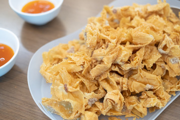 Fried crispy dumpling wrapped pork