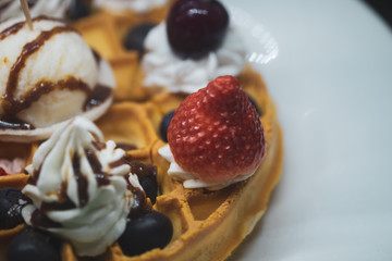 Waffle pancake desert with vanilla ice cream