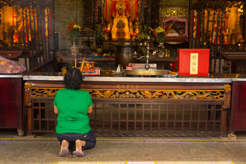 people make a pray at Chua Ba Thien Hau temple in Ho Chi Minh City, Vietnam