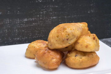 Close up view of a crunchy Cucur Ikan Bilis or Anchovies Fritters a Malay traditional evening dish.