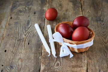 Brown easter eggs colored with onion husks in a basket