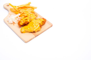 A copy space picture of cheesy chicken breast set with fries and coleslaw insight 