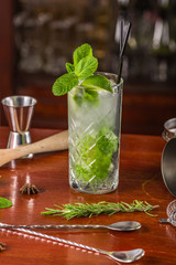 mojito cocktail on a wooden stand
