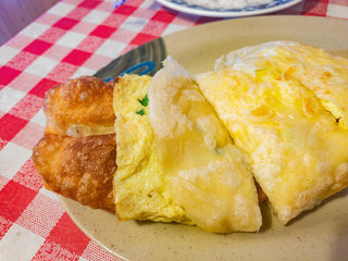 Close up shot of the Taiwanese style egg roll with fried bread stick