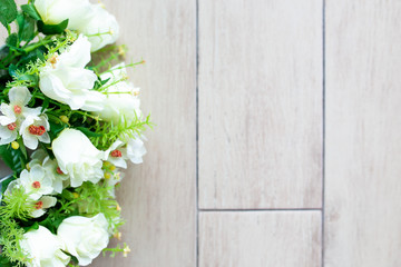 Flower bouquet on white wooden floor background with copy space.