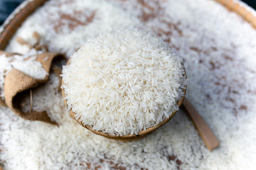 White rice on wooden basket