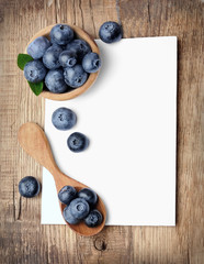 Naklejka na ściany i meble Recipe book with blueberry fruits.