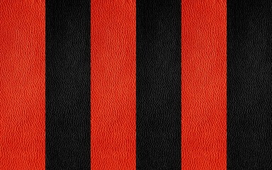Texture of genuine leather. Black and red background.