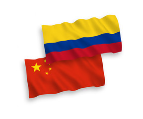 Flags of Colombia and China on a white background