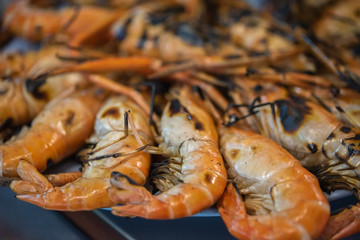 Close up of grilled prawns.