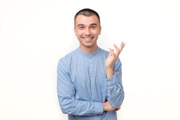 Fototapeta premium Happy smiling hispanic guy looking at camera isolated on white background