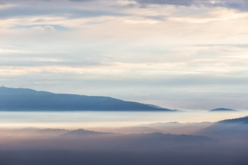 Sea of fog and mist between mountains and hills