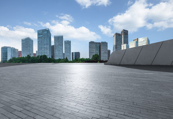 Empty city square road and modern business district office buildings in Beijing, China