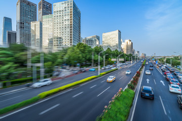 Fototapeta premium traffic on road and buildings in beijing