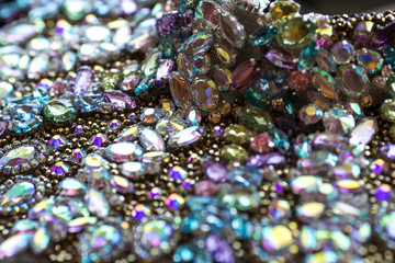 Shiny rhinestones closeup background. skirt covered with shiny rhinestones.