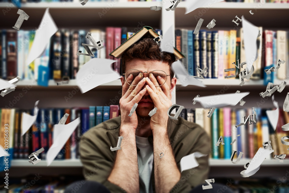 Poster tired university student has difficulty to study. concept of stress and difficulty