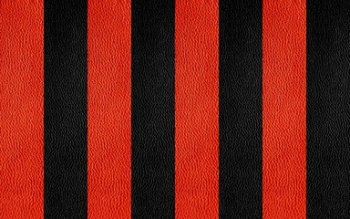 Fototapeta premium Texture of genuine leather. Black and red background.