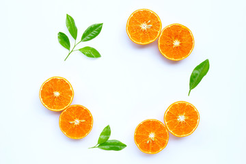 High vitamin C, Juicy orange fruit with leaves on white background.