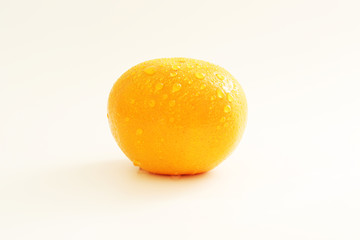 Orange with water drop on white background