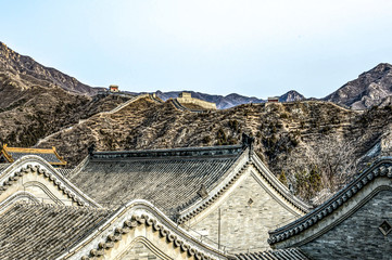 Buildings of a fragment of the Great Chinese Wall in the mountains near Bejing