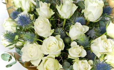 Fototapeta na wymiar White rose bouqet for valentines day. Romanitc flower arrangement isolated