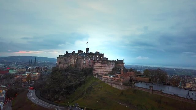 Drone pivot around the Edinburgh Castle in Scotland. This is the castle that originally inspired J.K. Rowling to create Hogwarts. 4K 29fps