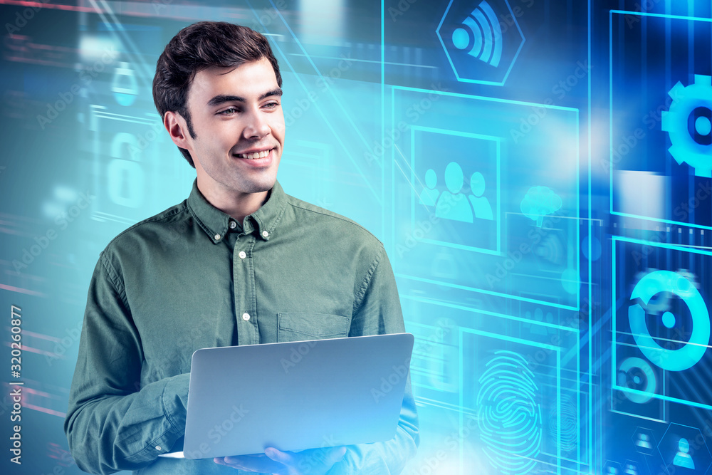 Poster smiling young engineer and graphical interface