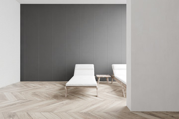 Gray spa room interior with benches