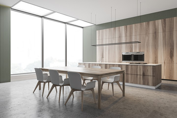 Fototapeta na wymiar Gray and wooden kitchen corner, counters and table