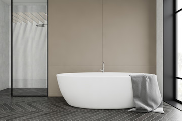Fototapeta na wymiar White and beige bathroom with tub and shower