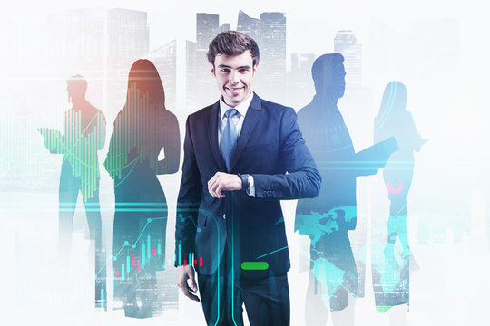 CEO with smartwatch and his team in city