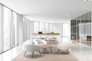 White office with coworking and lounge area