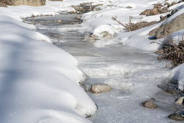 Channel of a frozen mountain river