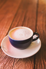 cup of coffee on table in cafe