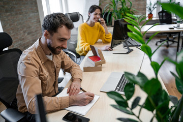 Office managers in work process, happy workers, lovely job. Internet sales, e-business, e-commerce, targeting advertising, smm management, service for ordering and delivering products on the Internet