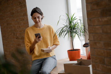 Chatting with a team of online merchants. Young small business owner, selling online on a website. Online Sales, E-Commerce, E-Business, with postal parcel, selling online, delivery concept.