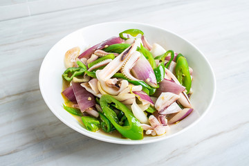 Chinese regular dish fried squid with onion and green pepper