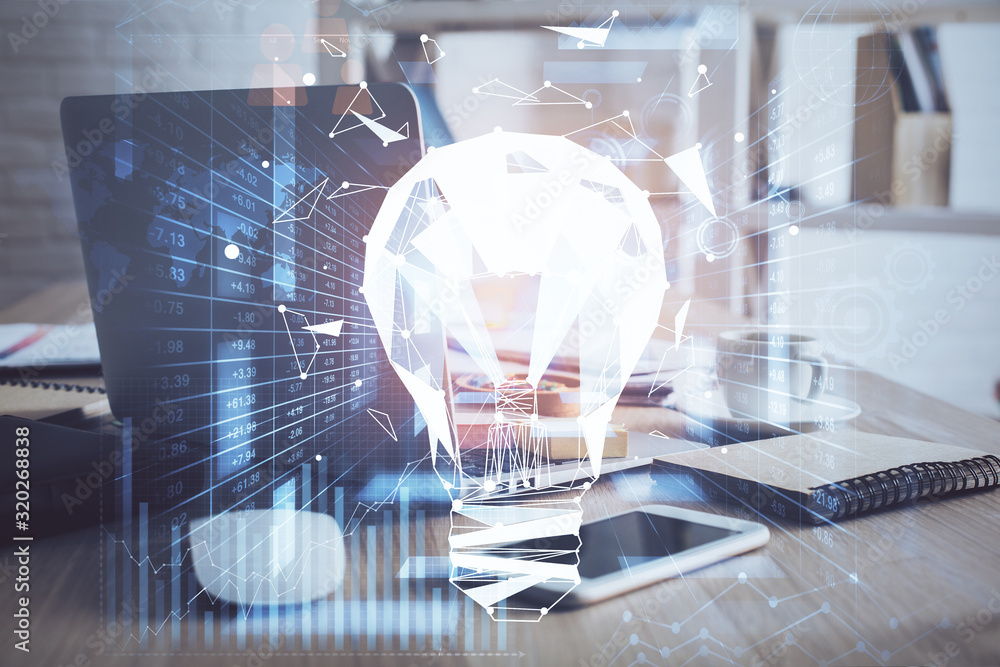 Aufkleber Computer on desktop in office with bulb icon hologram. Multi exposure. Concept of idea.