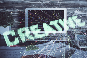 Obraz premium Desktop computer background in office and start up theme hologram drawing. Double exposure. Startup concept.