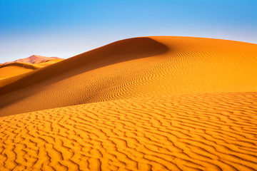 Amazing view of sand dunes in the Sahara Desert. Location: Sahara Desert, Merzouga, Morocco. Artistic picture. Beauty world.