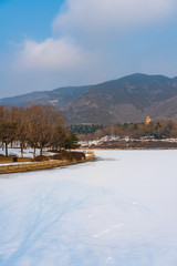 Chengjing lake of Beijing Botanical Garden after snow in winter. 