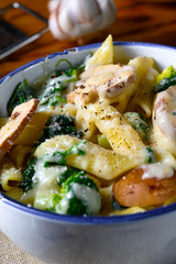 Real pasta with mushrooms, spinach and broccoli