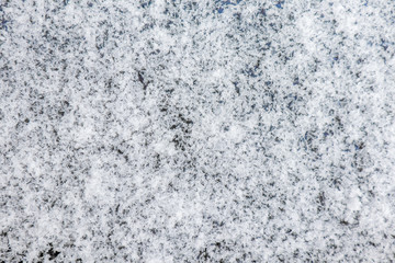 Fototapeta na wymiar snow on a dark blue background