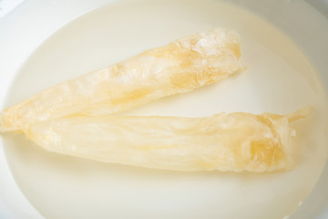 Traditional health and nourishing food Maw, catfish glue soaked in water