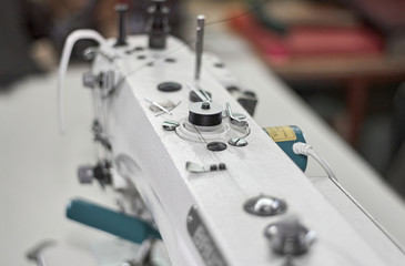 Fototapeta na wymiar Detail of industrial sewing machine