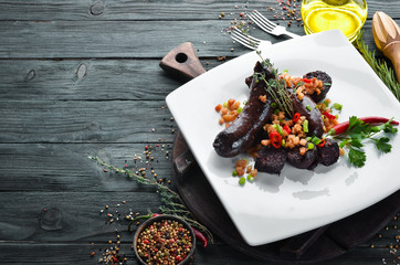 Sausage with buckwheat and blood. Restaurant dishes. Top view. Free copy space.